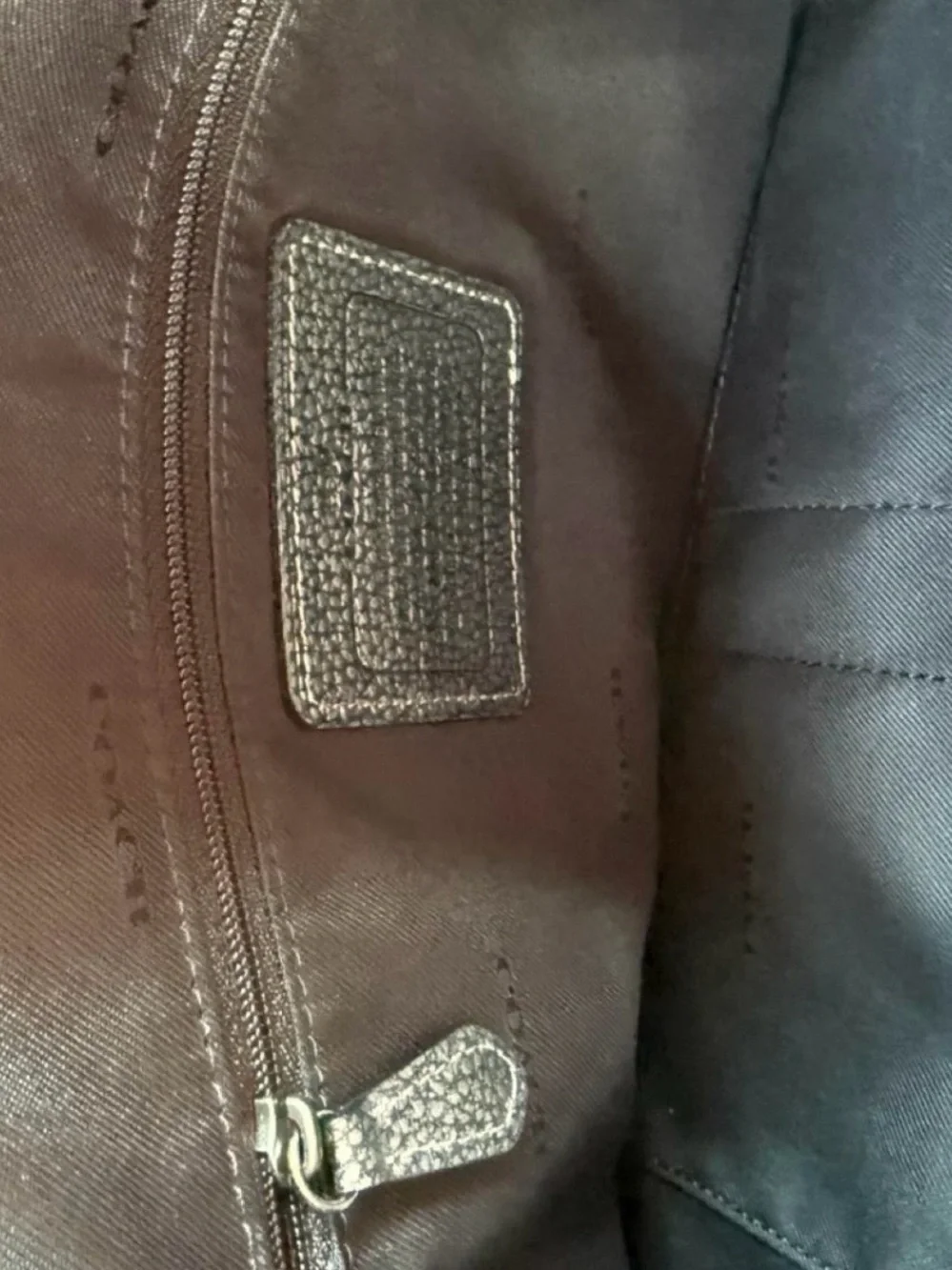 Coach sleek metallic