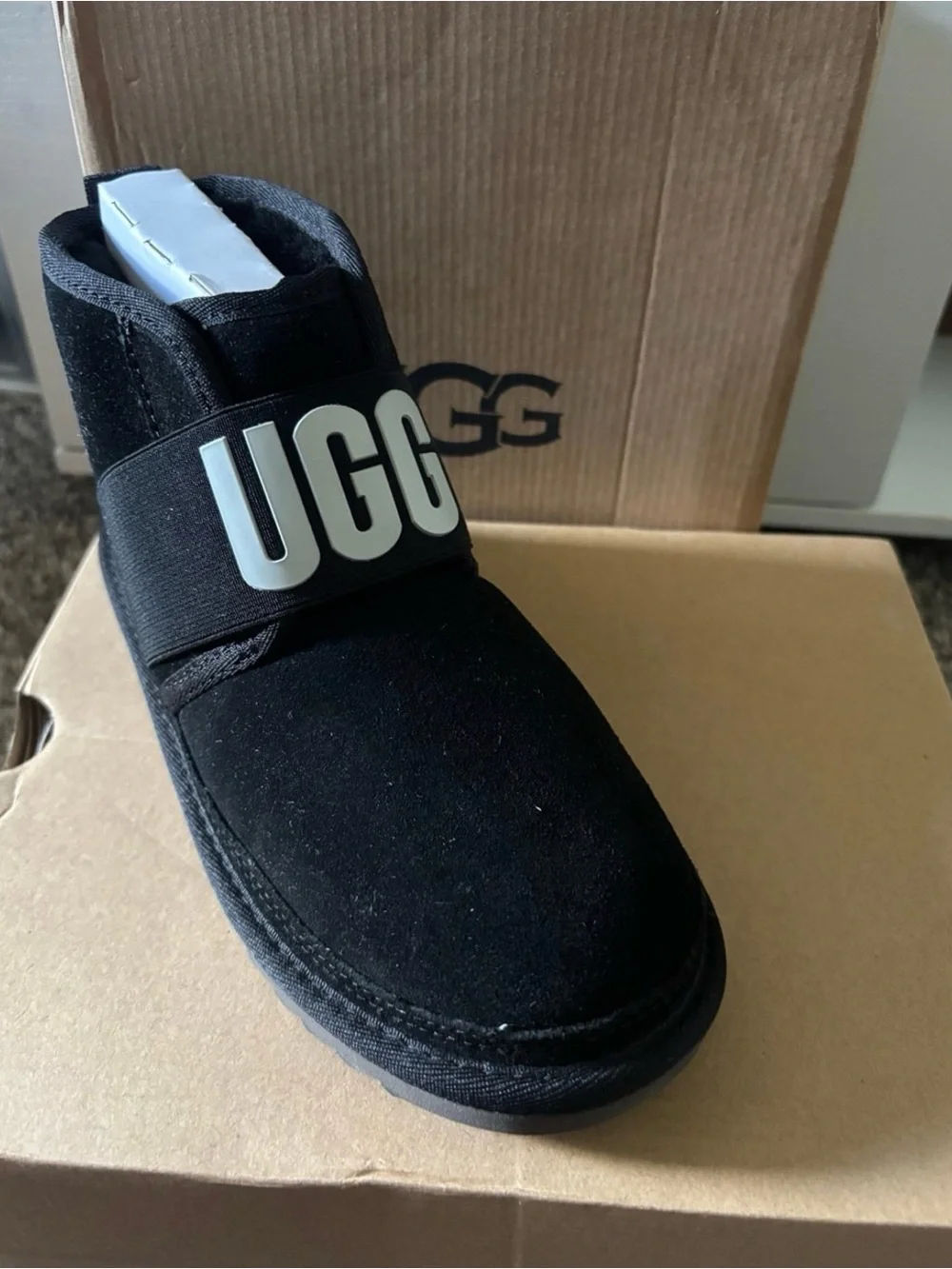 UGG Kids Black Suede Slip-On Boot with Logo Strap