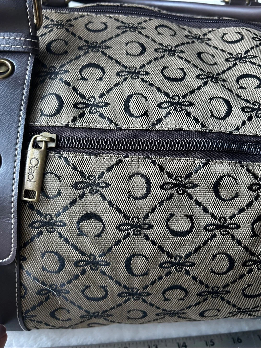 CIAO! 22” duffle bag with faux leather handles buckle