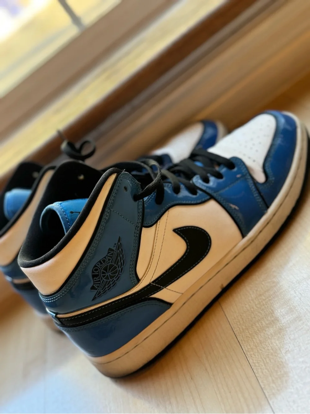 Jordan Men’s High-Top Sneakers in White, Blue and Black