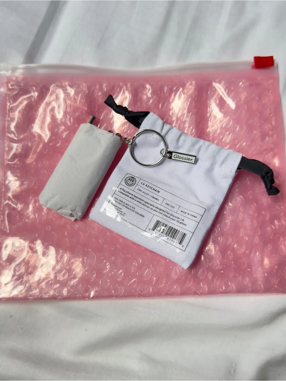 Glossier branded flip