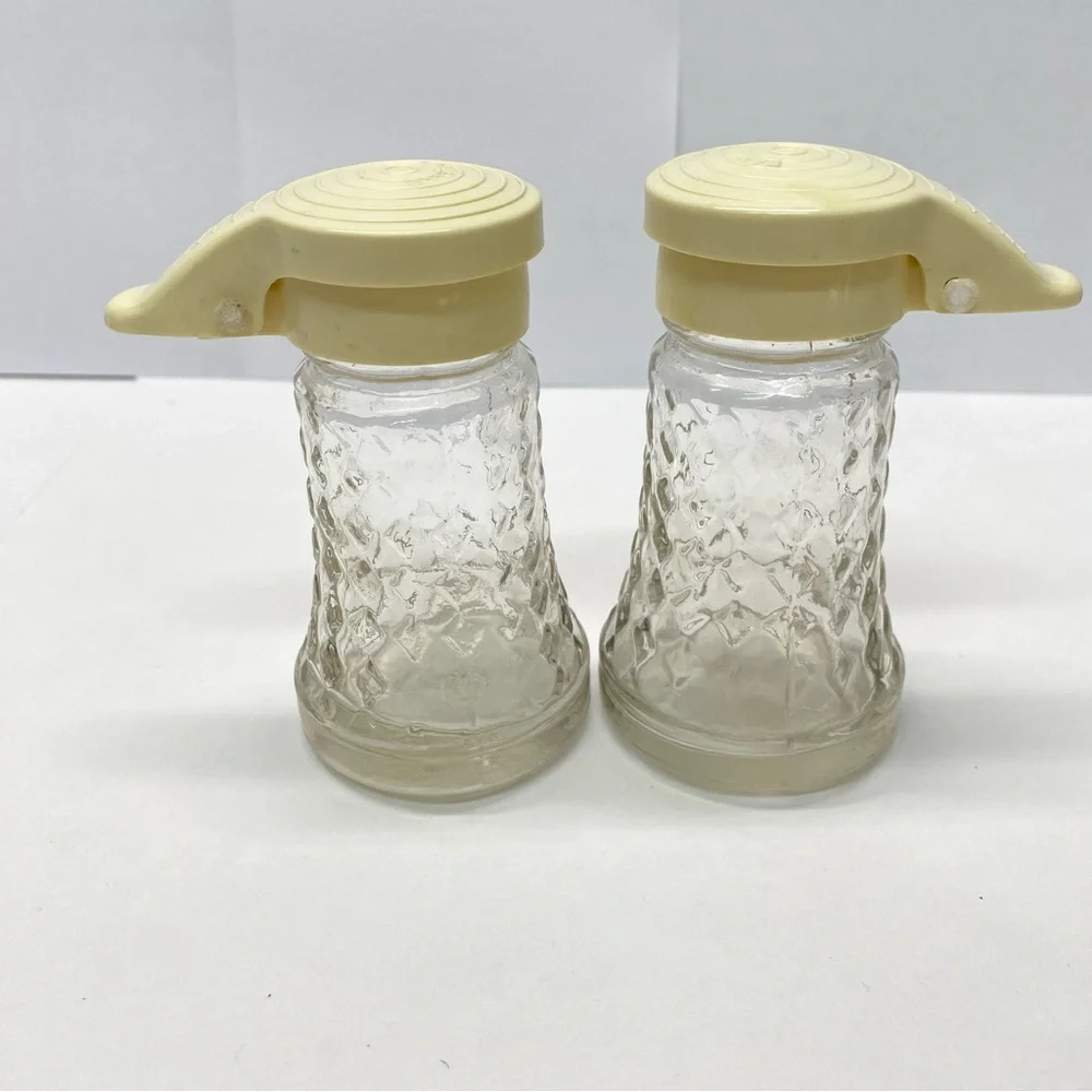 Vintage Daniells Salt and Pepper Shakers Set Beige Top Glass Bottom Plastic Tops