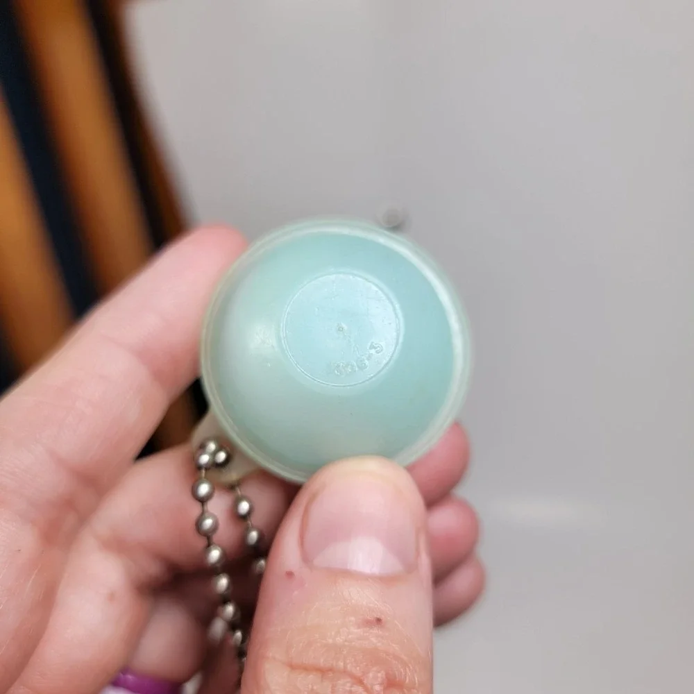 Tupperware product keychain