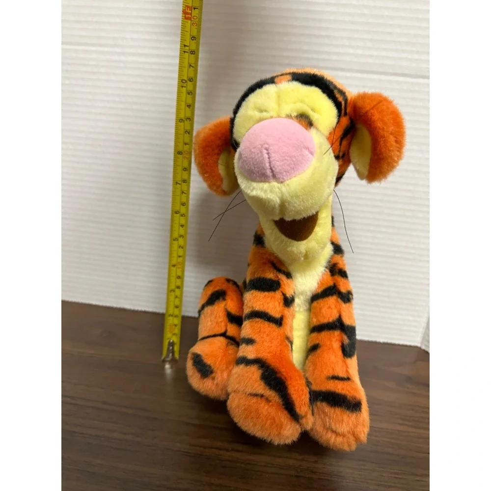 Disney pooh plush tail