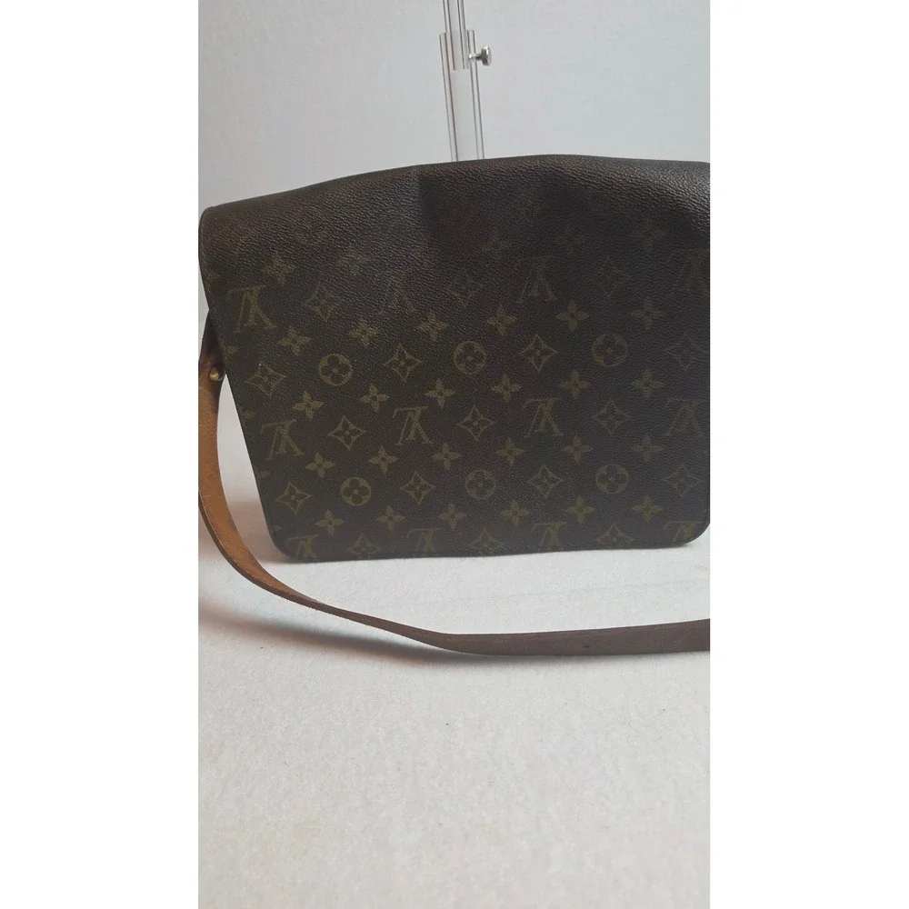 Louis Vuitton dark scuffs