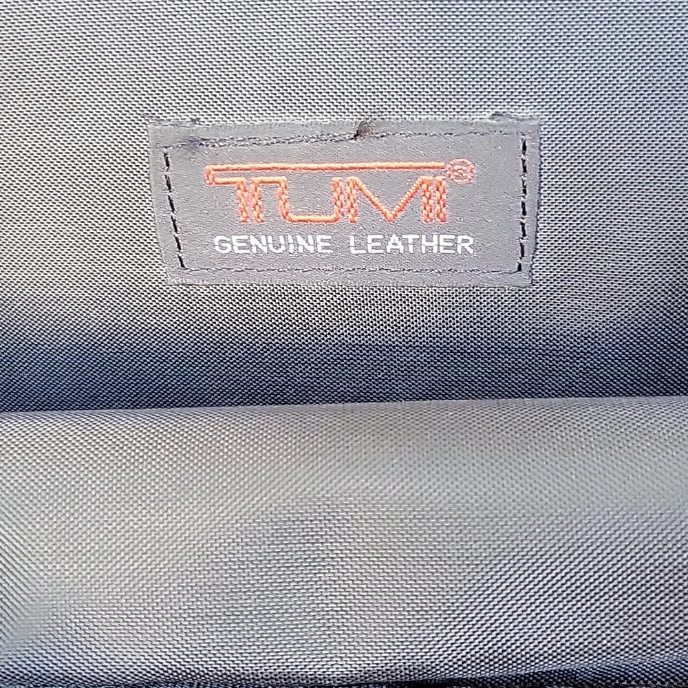 Tumi leather expandable