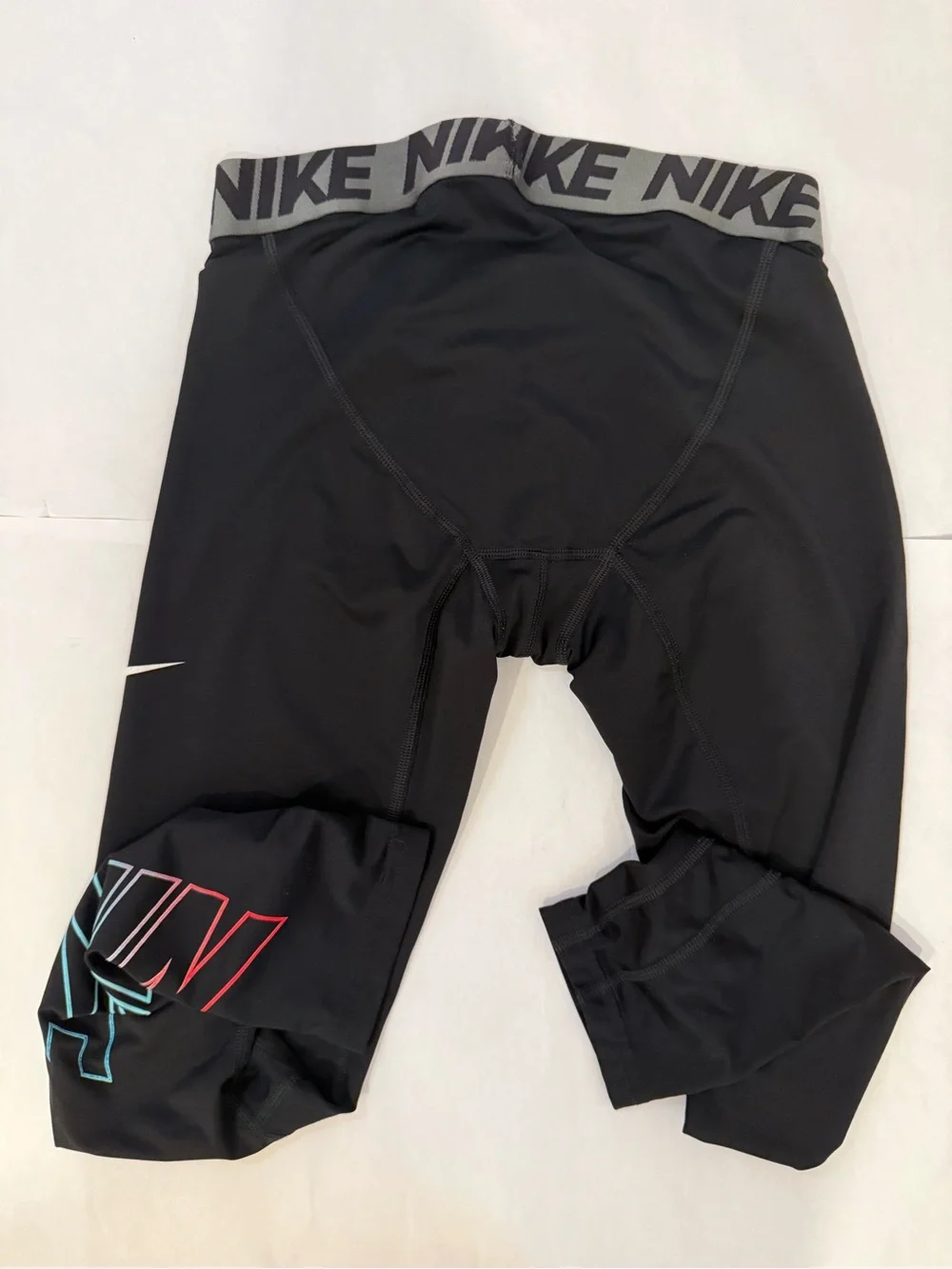 Nike Black Leggings with Red & Teal Logo Accents