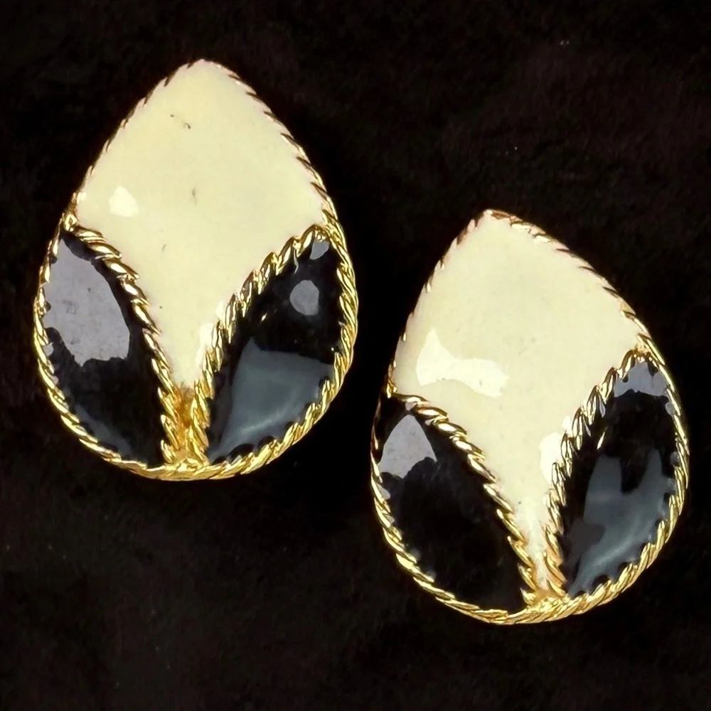 Vintage goldtone, black and cream enamel clip on earrings