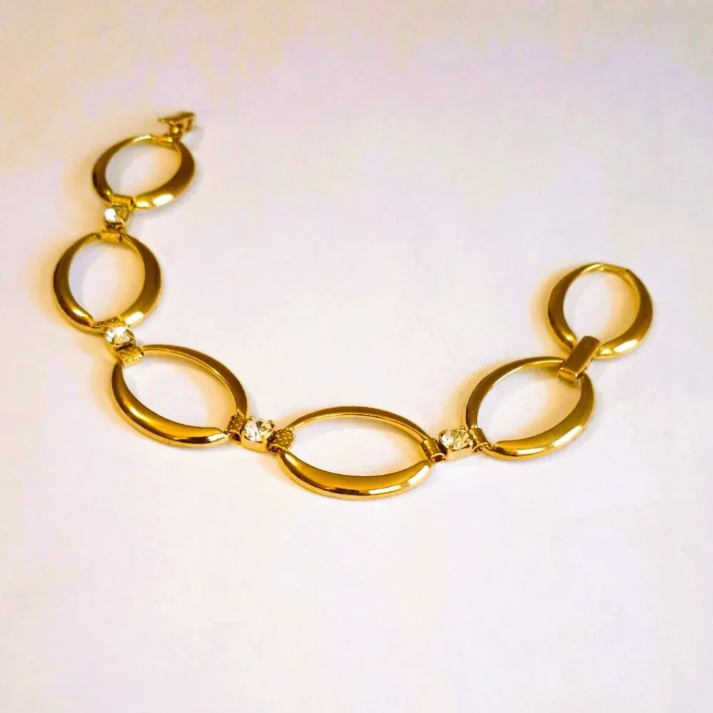 Avon gold tone
