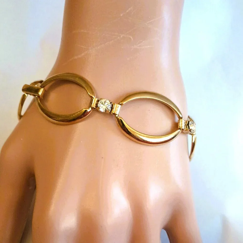 Avon gold tone