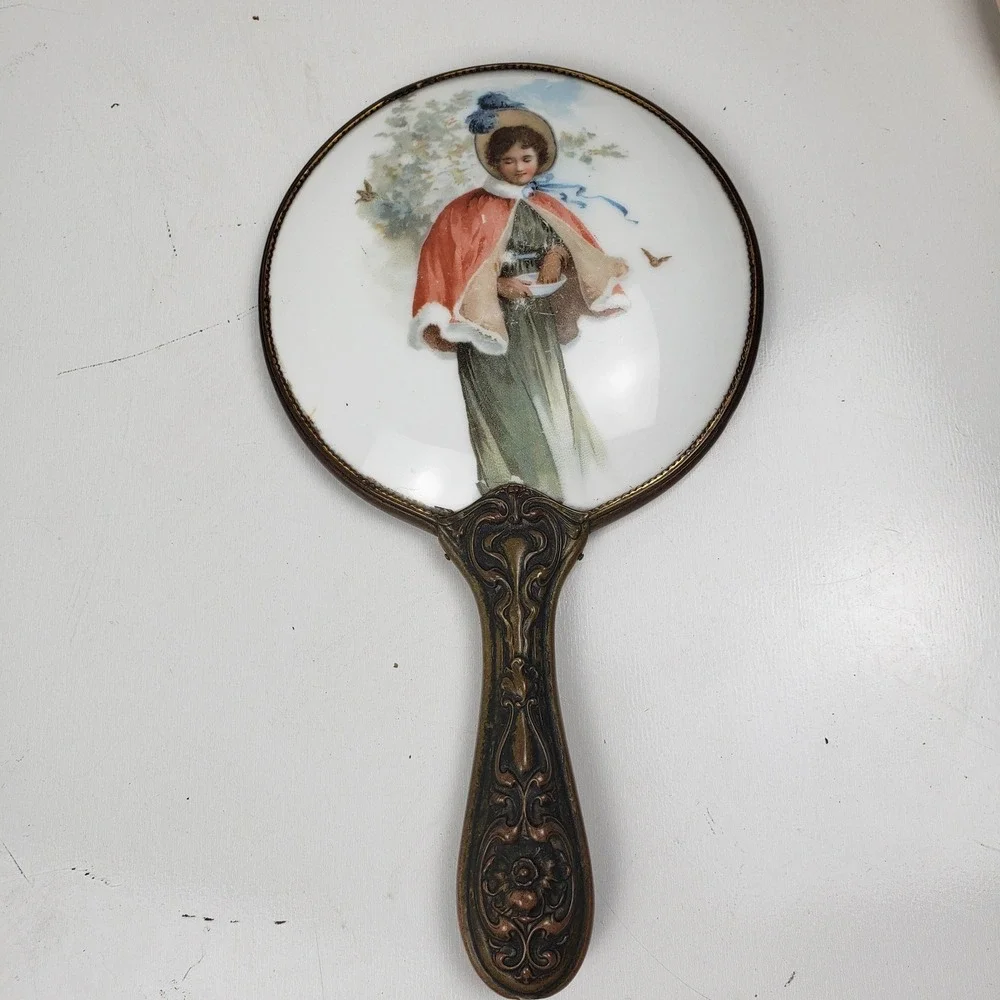 Vintage Victorian Style Hand Mirror Ornate Brass Porcelain Lady Red Cape Beveled