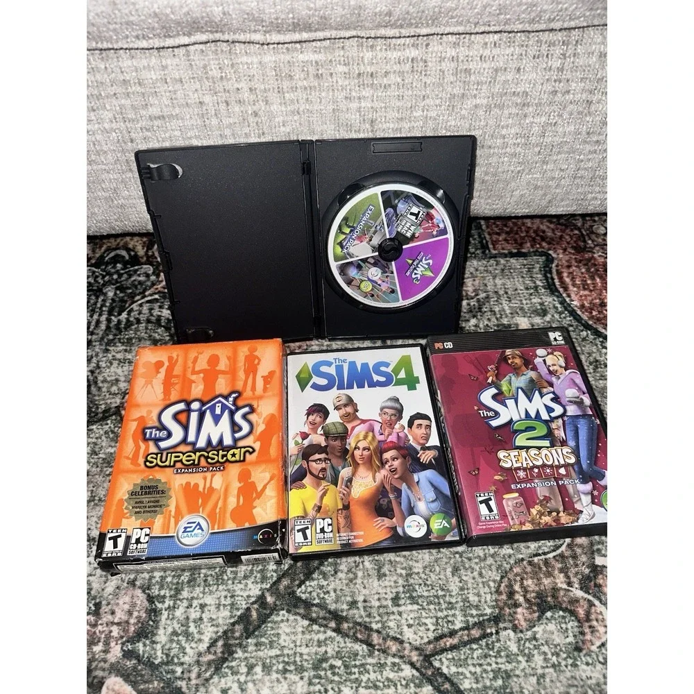 Lot Of 4 PC Games -‎ The Sims 2,3,4 Expansion Packs, Superstar, Seasons…