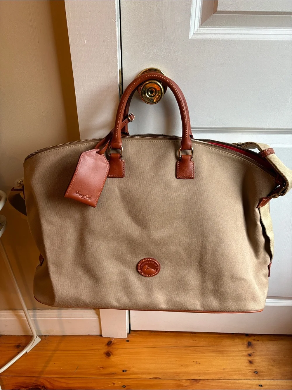 Dooney & Bourke Beige Canvas Duffel with Brown Leather Trim