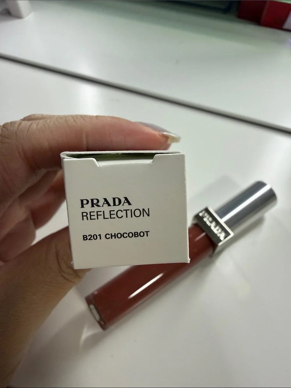 Prada glossy lip