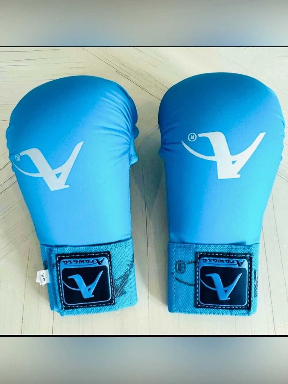 Arawaza youth fist