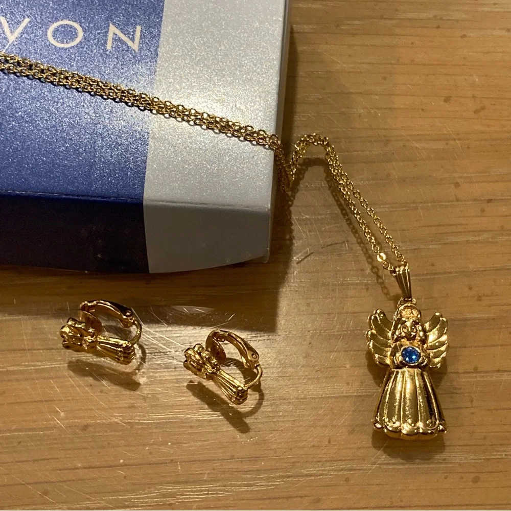 Vintage 90’s Avon Golden Heavenly Angel Pendant/Clip on Earrings. Blue Stone
