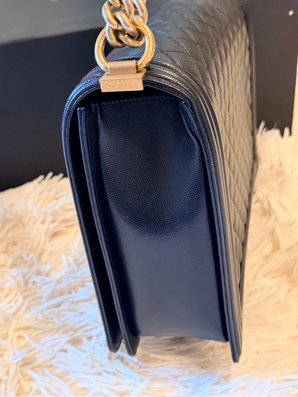 CHANEL Black Quilted Shoulder Bag with Gold Hardware and Chain Strap