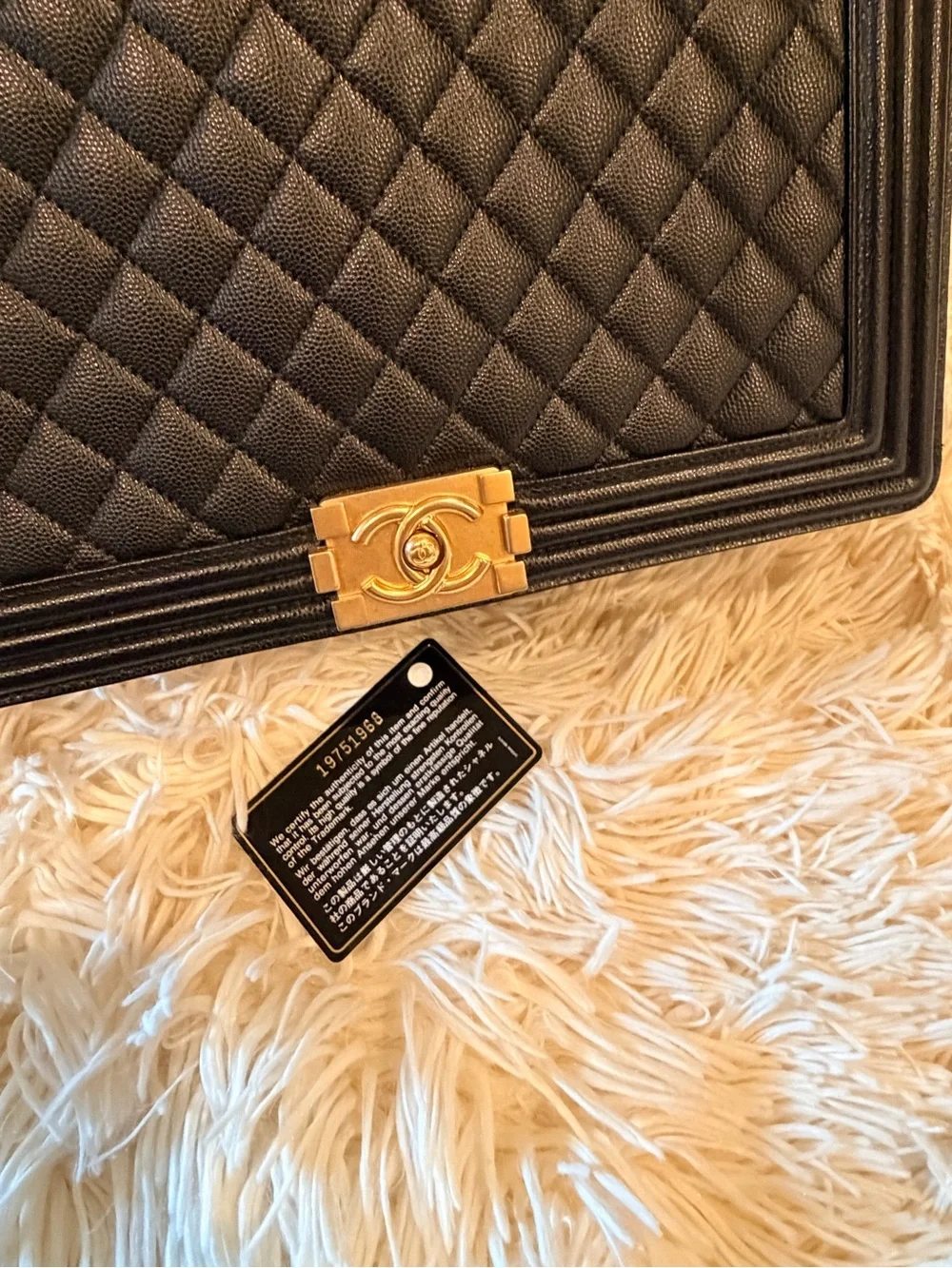 CHANEL Black Quilted Shoulder Bag with Gold Hardware and Chain Strap