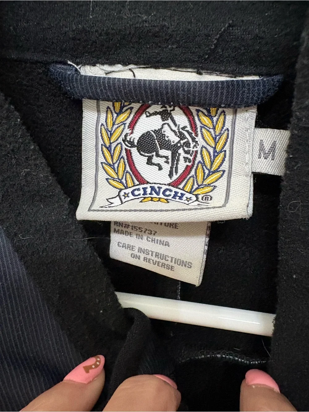 Cinch branded sleeveless