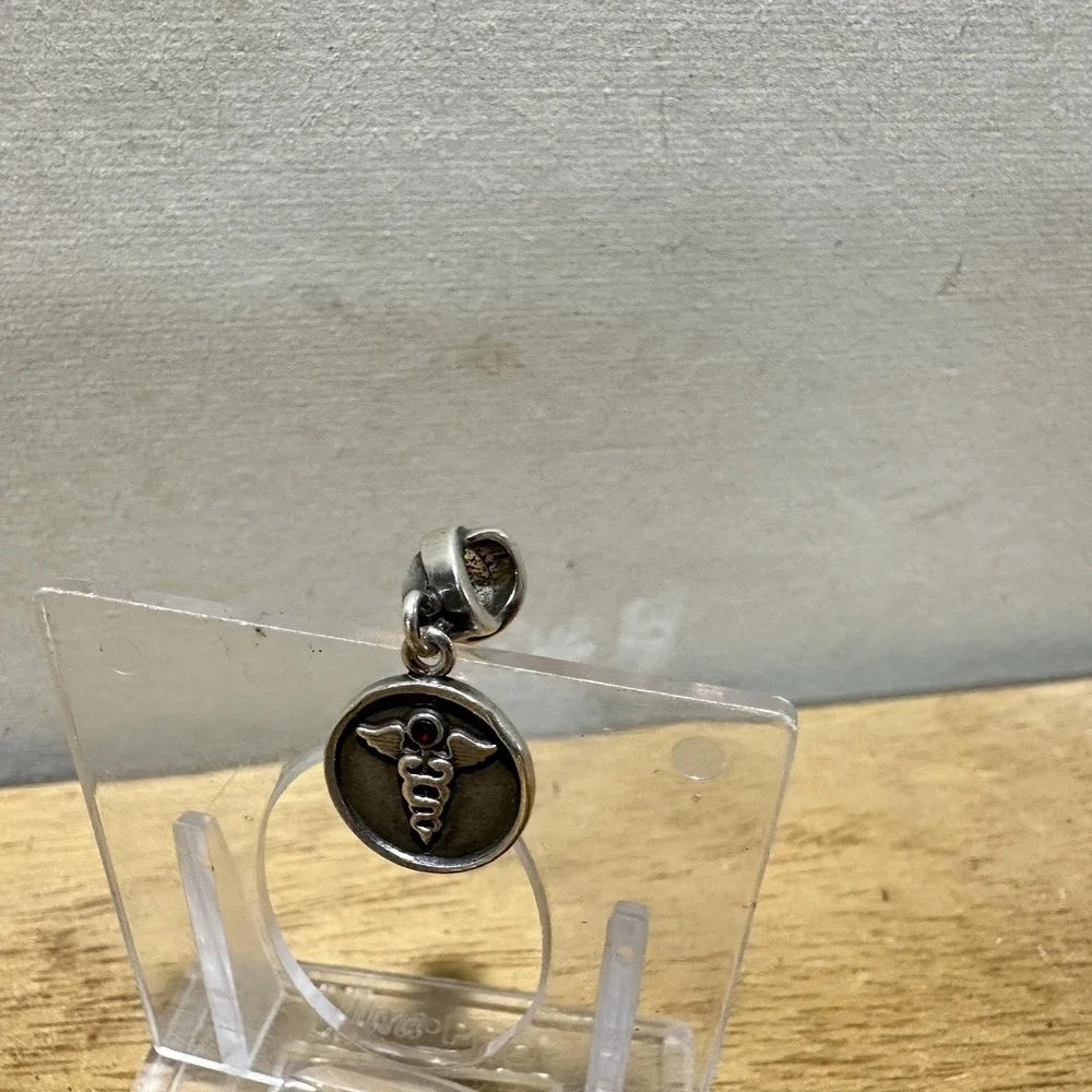 Source Unknown sterling silver